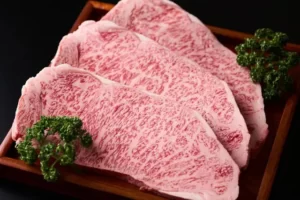 beautiful cuts of raw marbled wagyu beef kobe