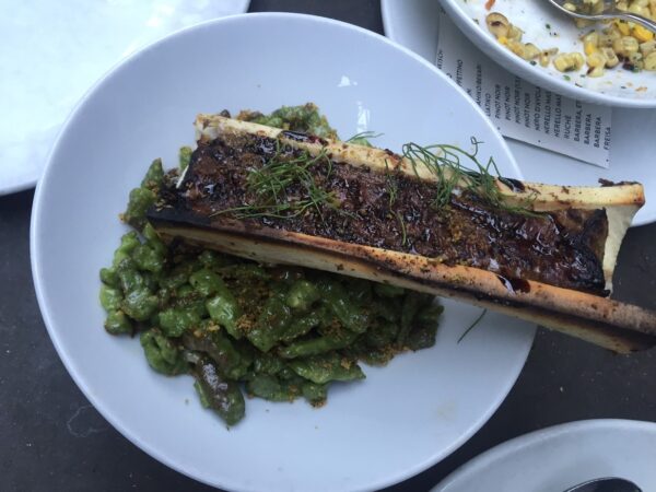 Bone marrow pasta on a white dish